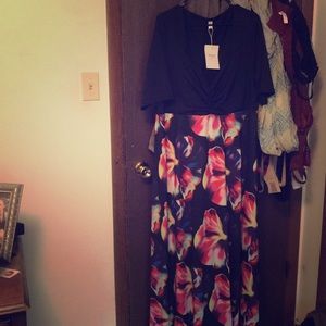 3/4 sleeve dress with flowy flower skirt.